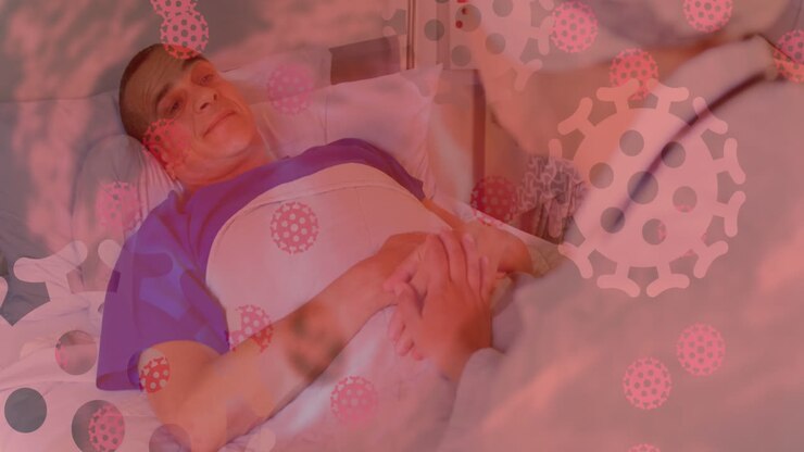 Cellule Covid-19 contro un'infermiera che parla con un paziente maschio