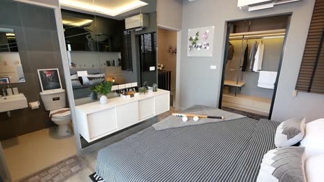 diseño de interiores de dormitorio contemporáneo moderno con manta blanca y negra, cama king size, sin personas, panning-2