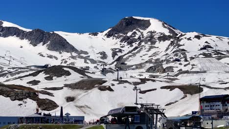 to a stunning backdrop of snow covered mountains the cable cars at kitzsteinhorn operate all year round