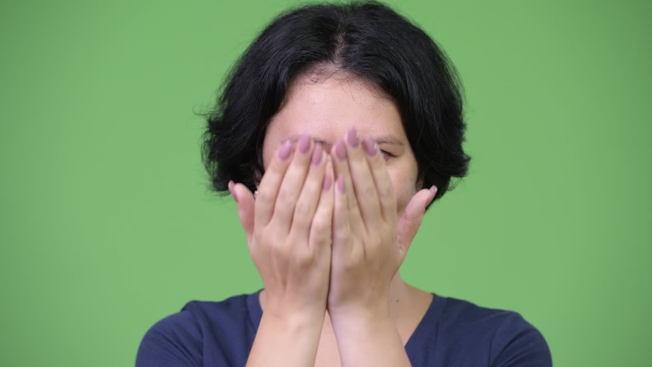Happy beautiful woman with short hair smiling