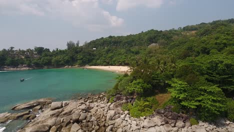 aerial side reveal shot of a beautiful beach in southern thailand