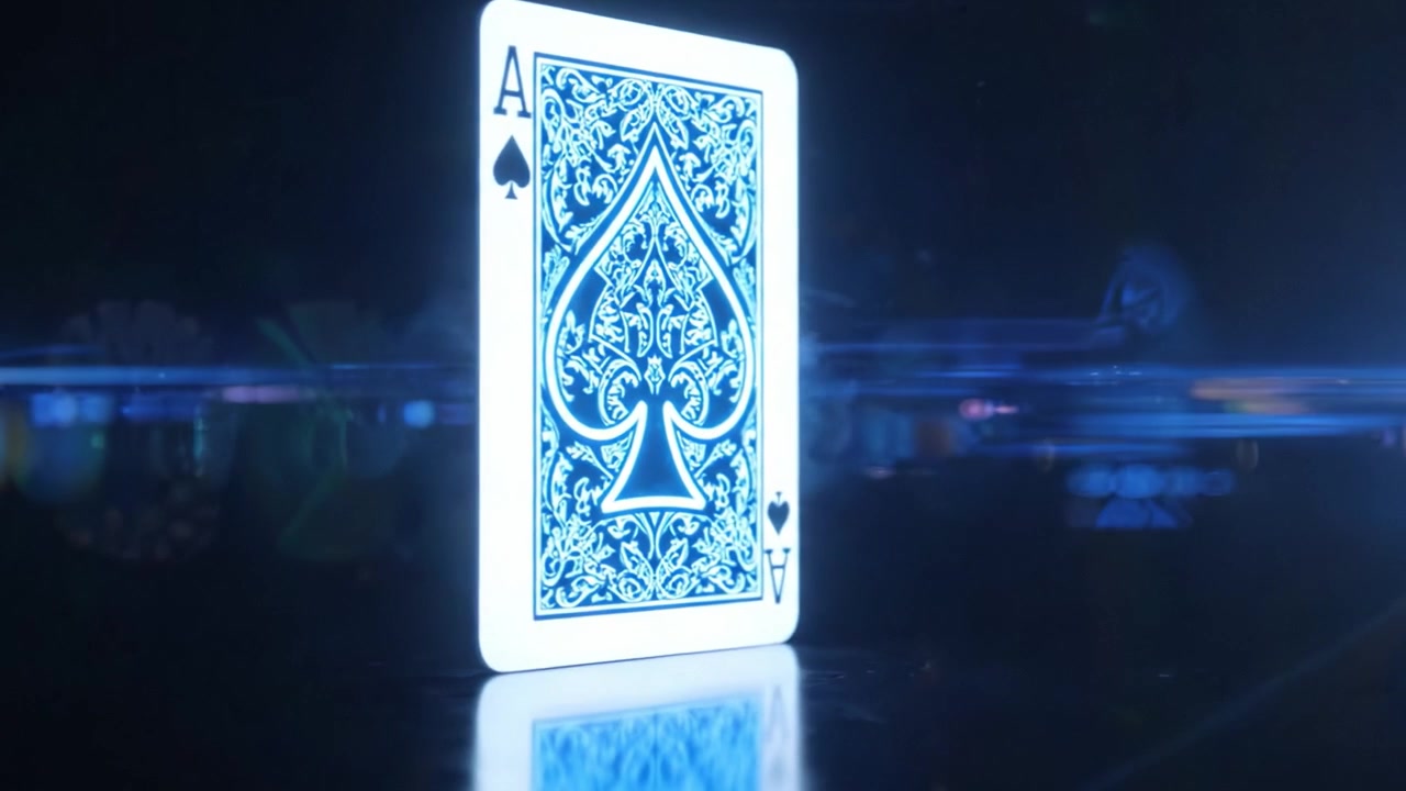 Mesmerizing Transformation of an Ace of Spades Playing Card Displaying a Stunning Neon Glow Against a Dark Background in a Captivating Visual Sequence