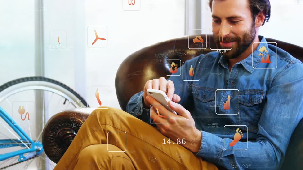 Seated man tapping smartphone screen activating floating data icons updating metrics for technology