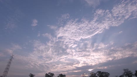 beautiful sky in early morning sunrise with sun rays passing