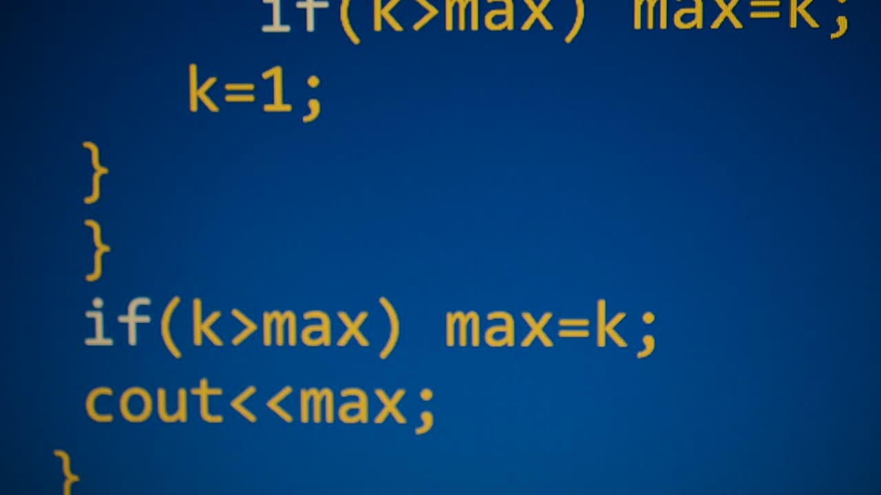 Source code on the monitor screen. Source code