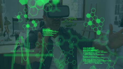 Animation-of-scientific-data-over-caucasian-man-wearing-vr-headset-in-office