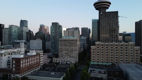 aerial drone footage of downtown vancouver buildings, gastown, early sunrise, morning urban scrapers view