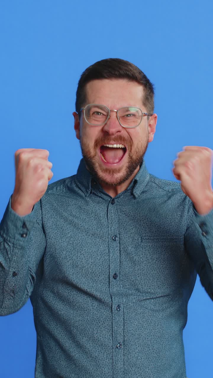 Happy caucasian man celebrate success winning birthday lottery jackpot goal achievement good news