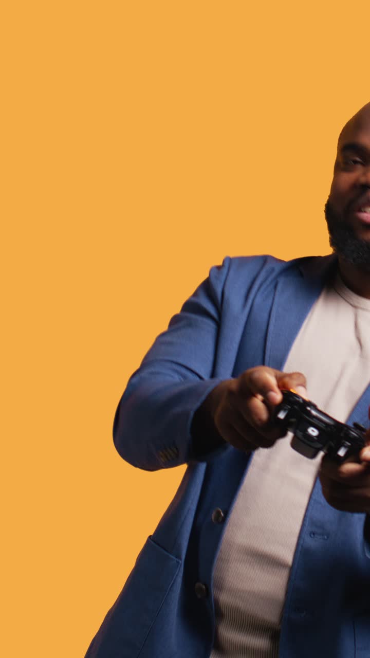 African American Man Playing Video Game with Controller