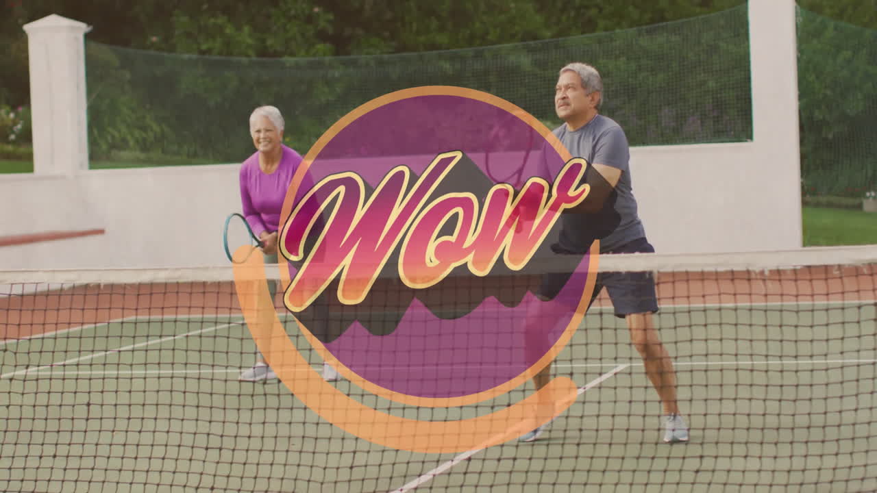 Senior man and woman playing tennis on court, displaying colorful ‘Wow' graphic overlay for health