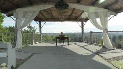 gorgeous outdoor wedding altar overlooking the gatineau hills at le belvédère events center in wakefield, quebec