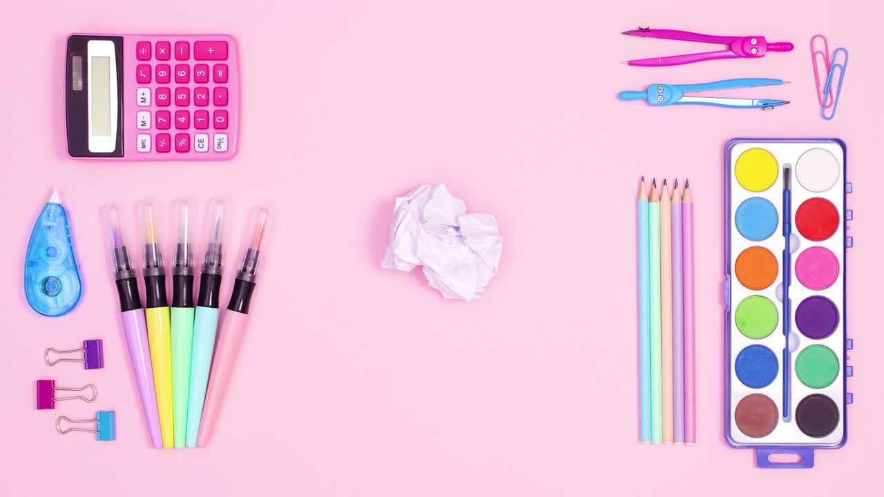 School tools appear on pastel pink theme and wrapped paper unwrap for text. Stop motion