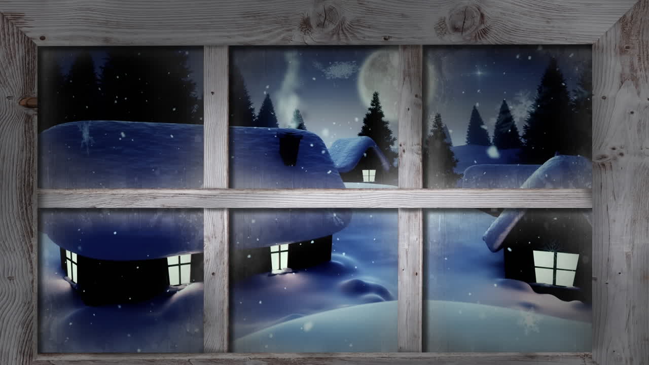 marco de ventana de madera contra la nieve que cae sobre varias casas y árboles en el paisaje de invierno