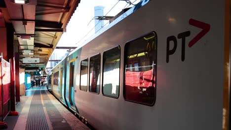 train approaching and stopping at the platform