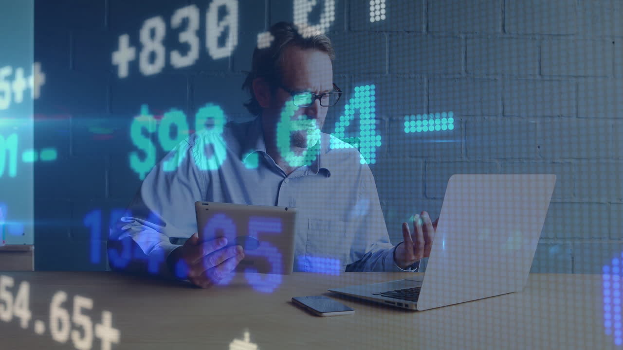 Animation of financial data processing over caucasian businessman using tablet