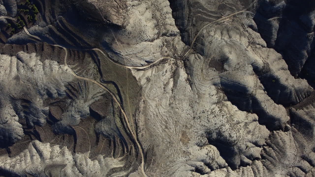 Aerial view of a rugged, dry landscape