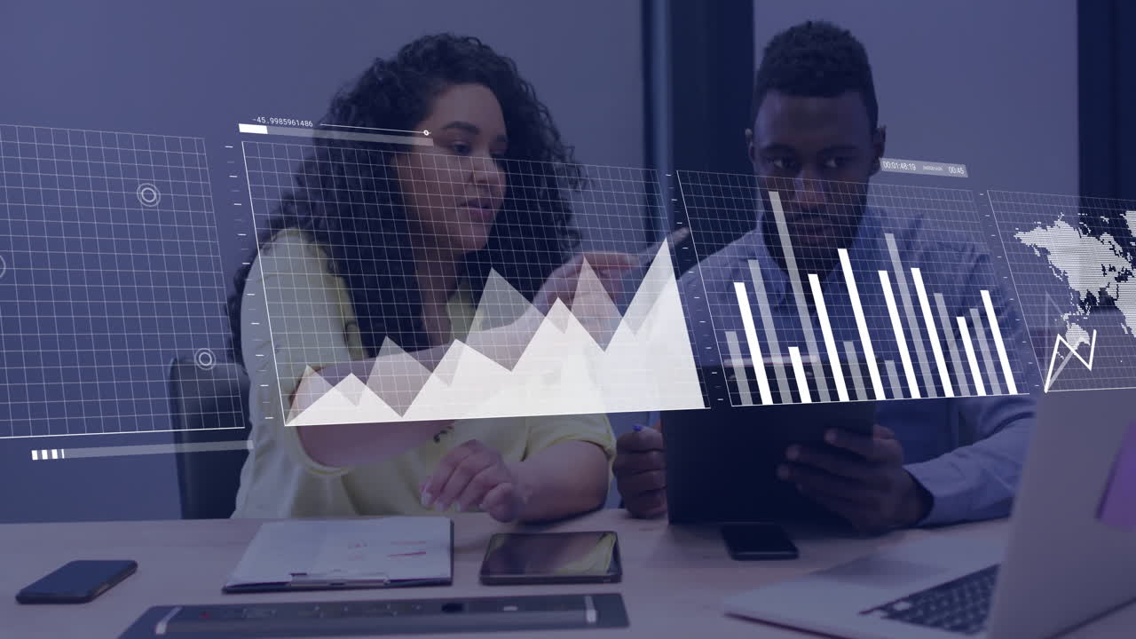 Analyzing data charts, business professionals using digital devices in office