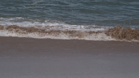 Breaking-waves-rolling-on-beach-at-the-North-Atlantic-coast-of-Portugal-in-slowmotion