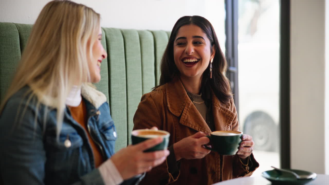 Two women having coffee at a cafe