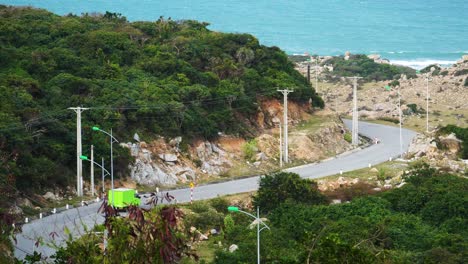 scene of phan rang coast with truck passing by highway