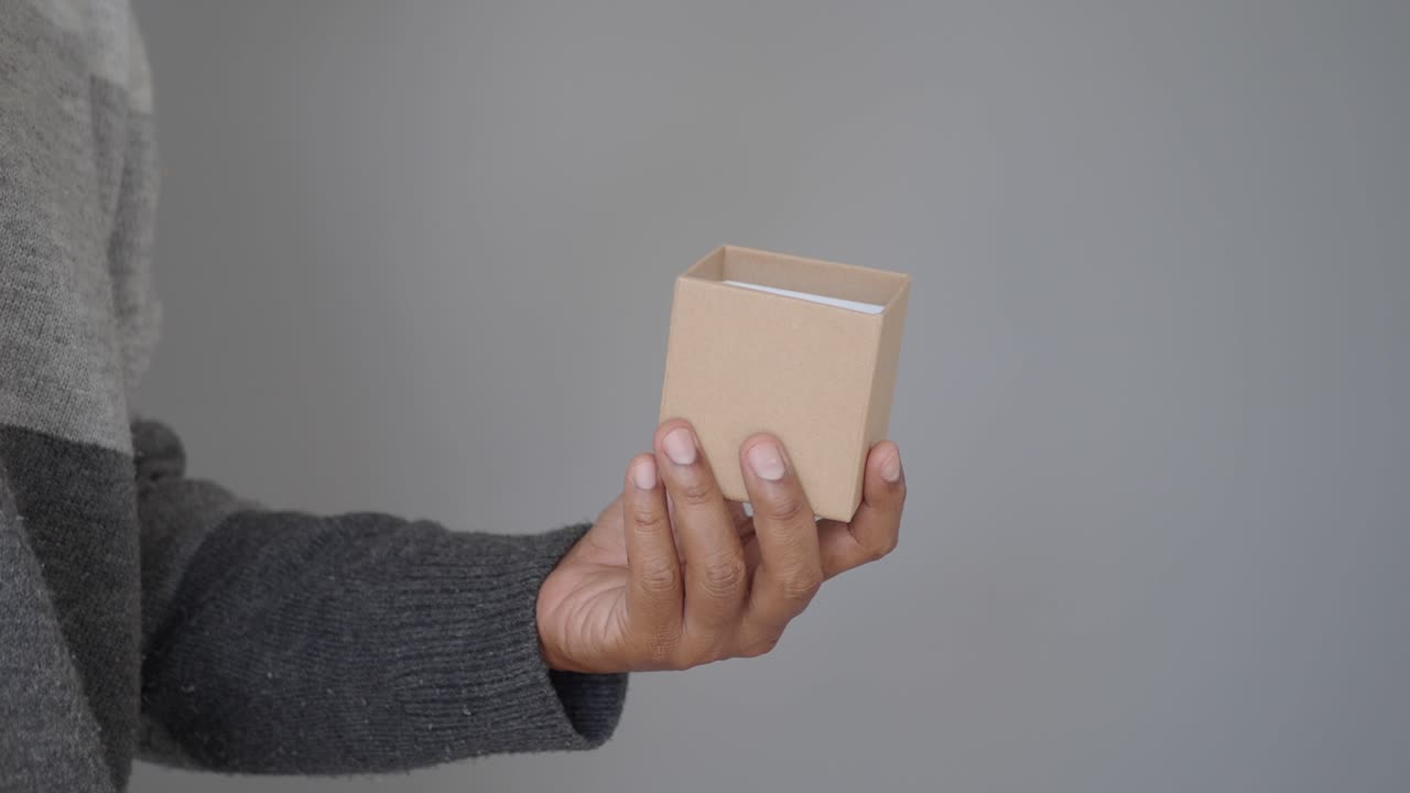 Opening a cardboard box