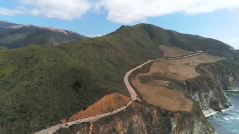 Aerial-Drone-Stock-Video-of-Bixby-Bridge-Highway-with-water-and-shore-below-in-Big-Sur-Monterrey-California