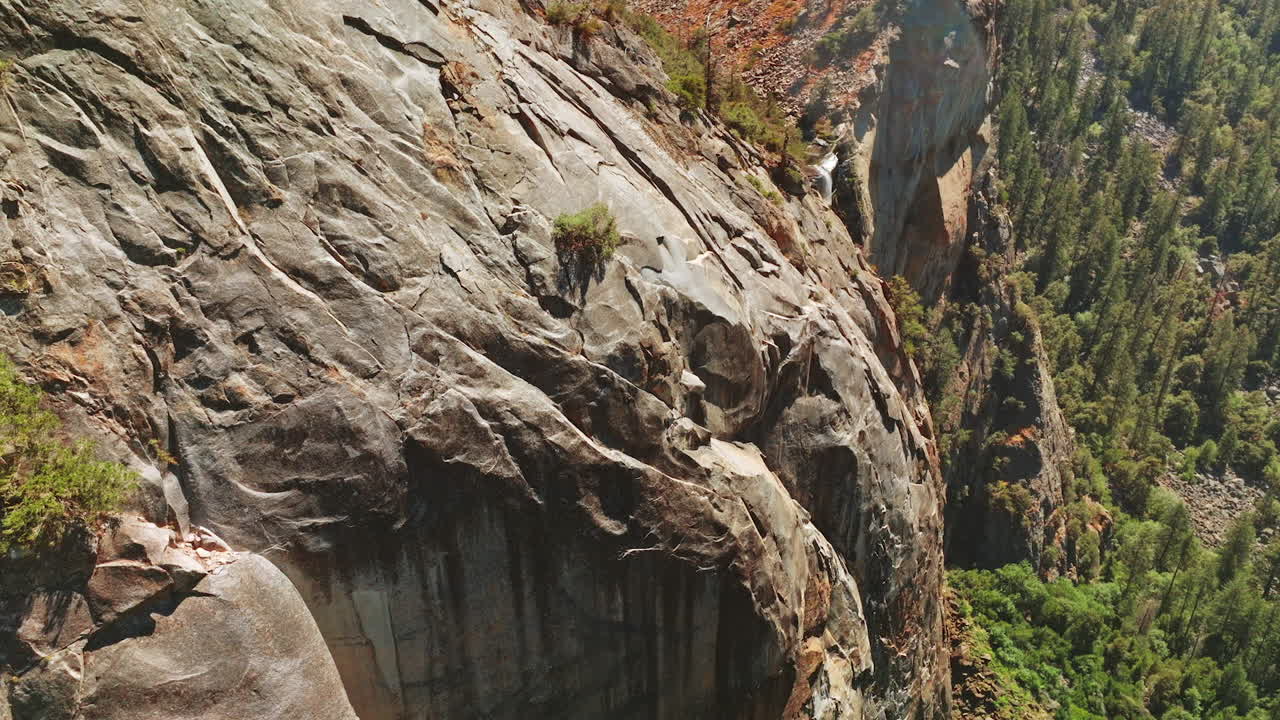 Aerial View of Yosemite Valley Rock Face and Waterfall