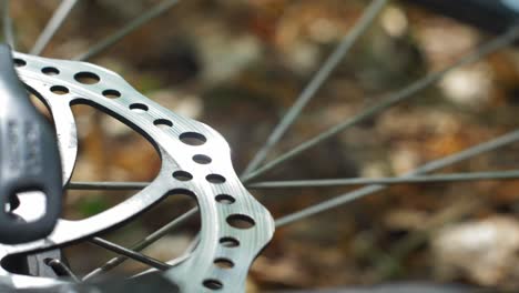 bicycle wheel brake disc and spokes rotating slow motion