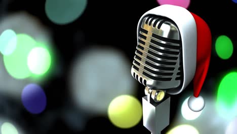 santa hat over microphone against colorful spots of light against black background