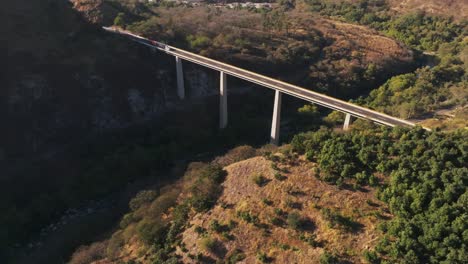 aerial reveal puente atenquique motorway to guadalajara towards colima in jalisco, mexico