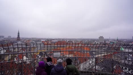 panoramic handheld circular view of downtown copenhagen on cloudy overcast day, denmark