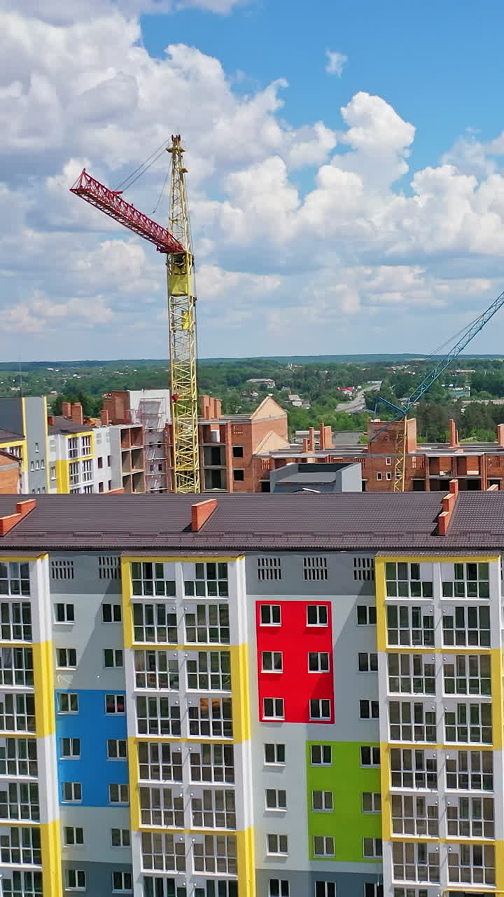 High crane works on building site