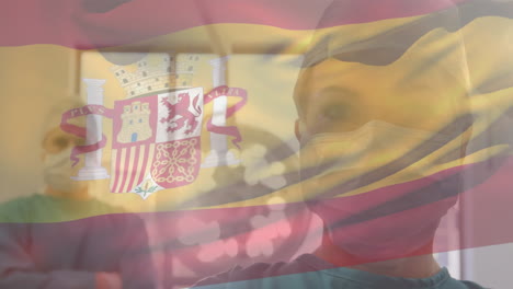 animation of flag of spain waving over surgeons in operating theatre