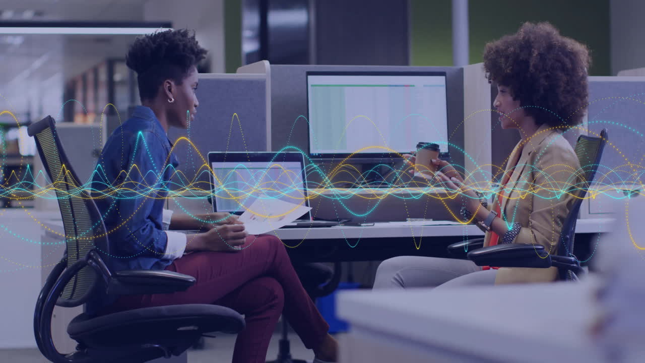 Animation of data processing over diverse business people working together in office