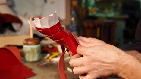 artisan braiding red leather