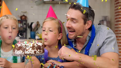 confetti animation over family celebrating birthday with cake and candles