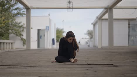 woman in contemporary dance pose outdoors