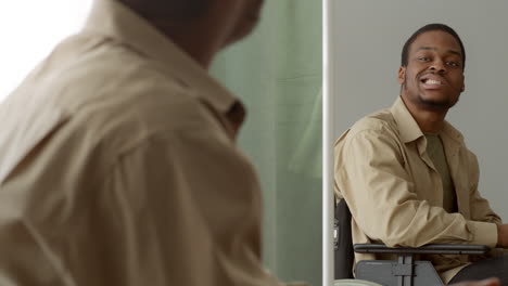 man in wheelchair in conversation