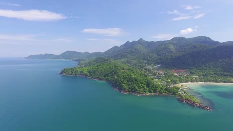 lush koh chang fantasy exotic island turquoise and green mountain range coastline aerial view