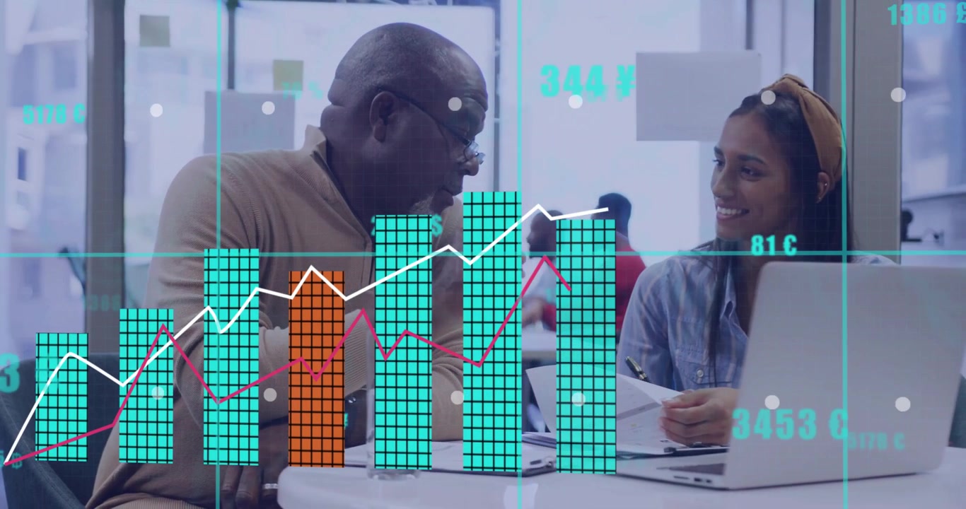 Senior consultant reviewing financial data with colleague as charts floating visualizing metrics