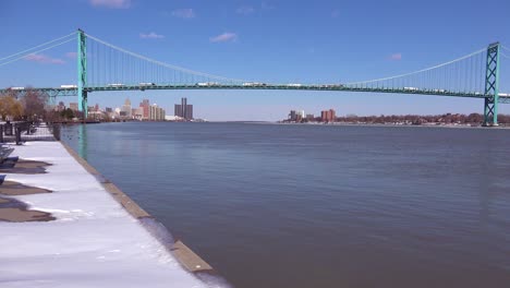 the detroit river ambassador bridge and gm tower near downtown detroit michigan 3