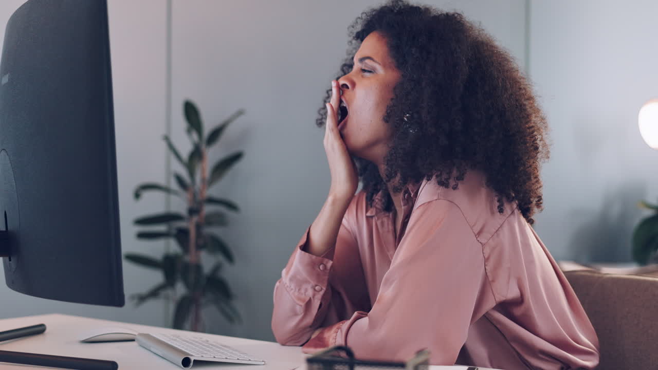 Business woman, tired and burnout at desk