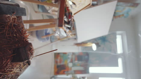 incense stick burning with smoke in art studio