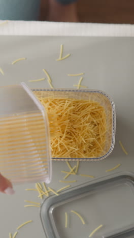 storing pasta in a plastic container