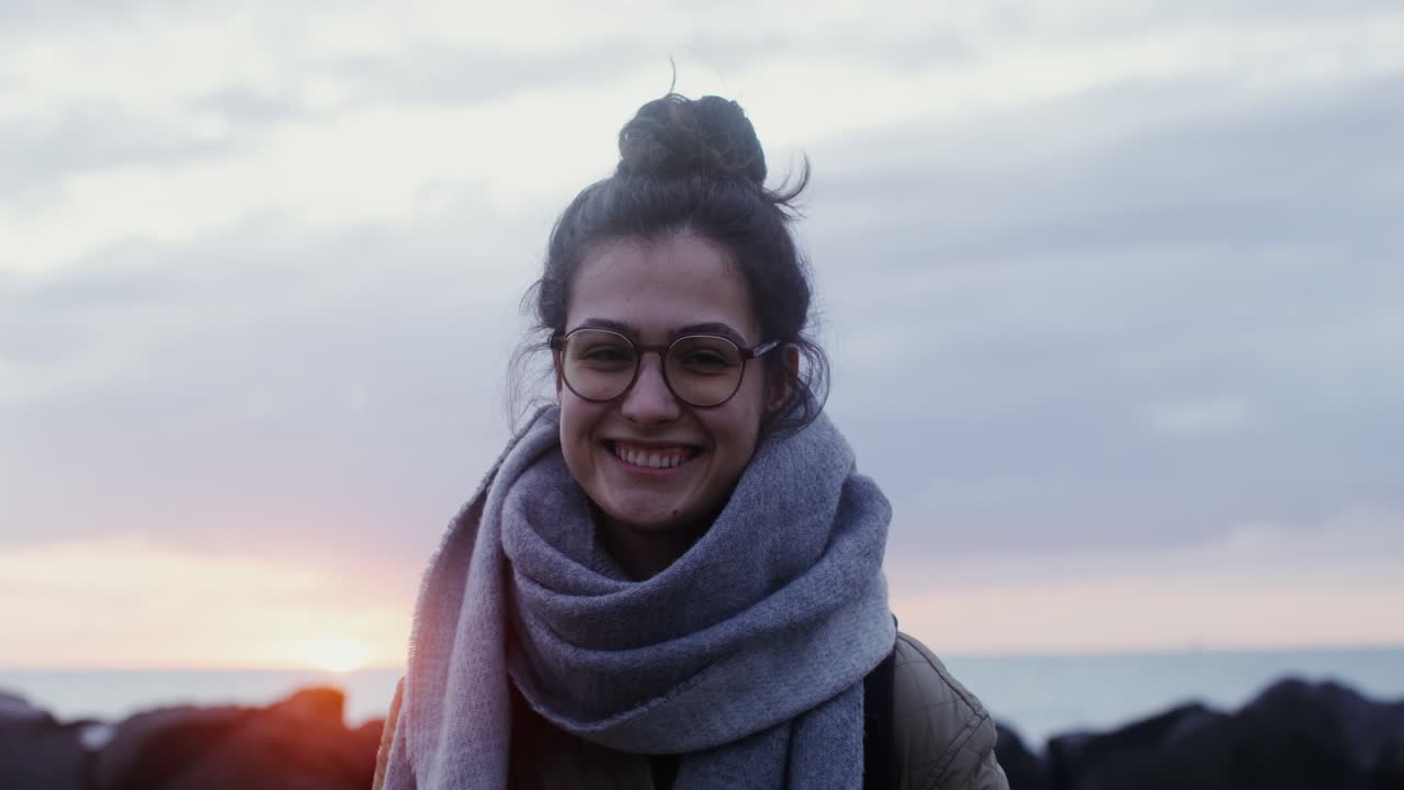 Smiling Woman at Sunset Beach
