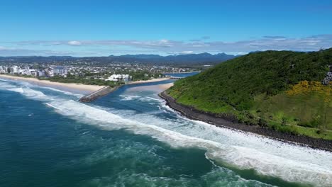 Stunning drone video of Burleigh Head National Park from the ocean, showing Gold Coast Tallebudgera River and southern beaches