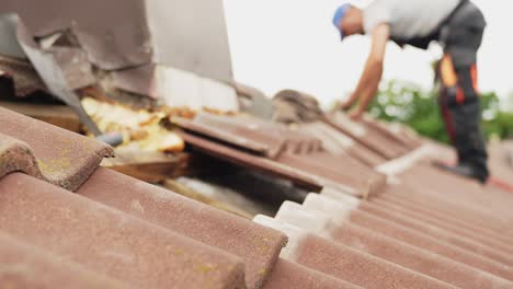 re installing rooftiles for parallel solar panel blocks macro closeup