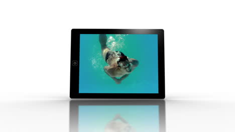 Media-device-screens-showing-girl-swimming