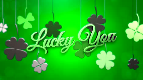 lucky you with hanging irish shamrocks on green gradient