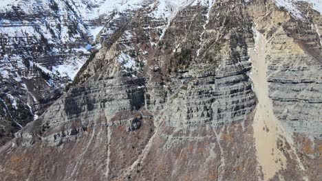 Excellent-Aerial-Shot-Of-A-Wintry-Mountain-Range-Dotted-With-Pine-Trees